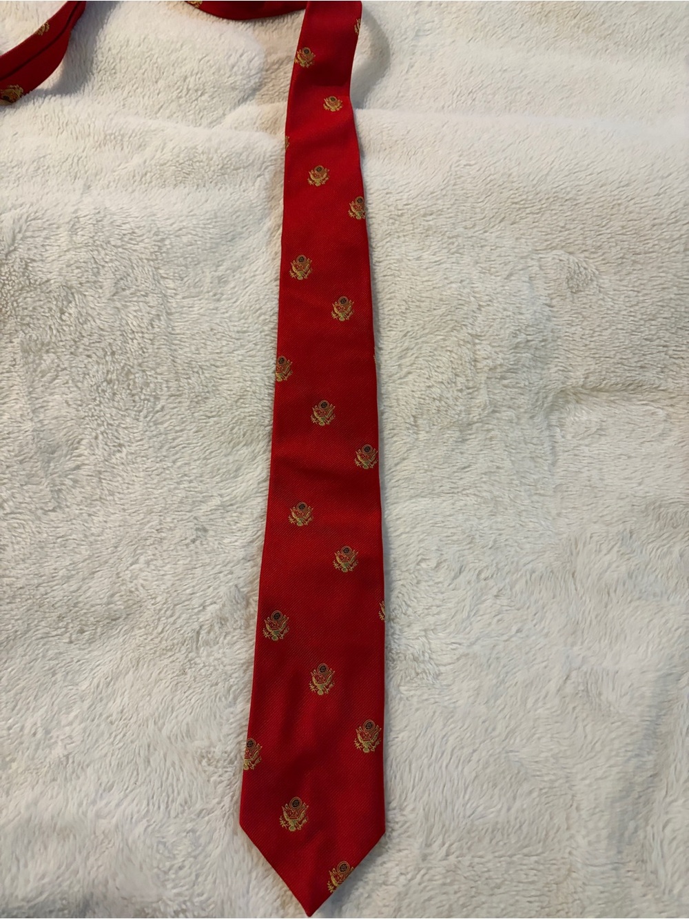 Men's Red Tie with Gold Crest Motif by Army officers wives club .